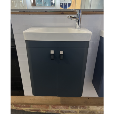Saneux Hyde two door ex-display vanity unit in matt fiord with ceramic basin shown in showroom location with doors closed